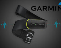 Garmin HRM600 Titelbild, Darstellung von vorn mit blauen Herzfrequenzlinien